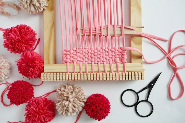 Rachel Denbow's Pom Pom Wall Hanging