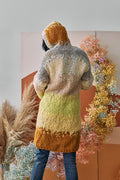 Model gives us the back view of the Soulshine Cardi