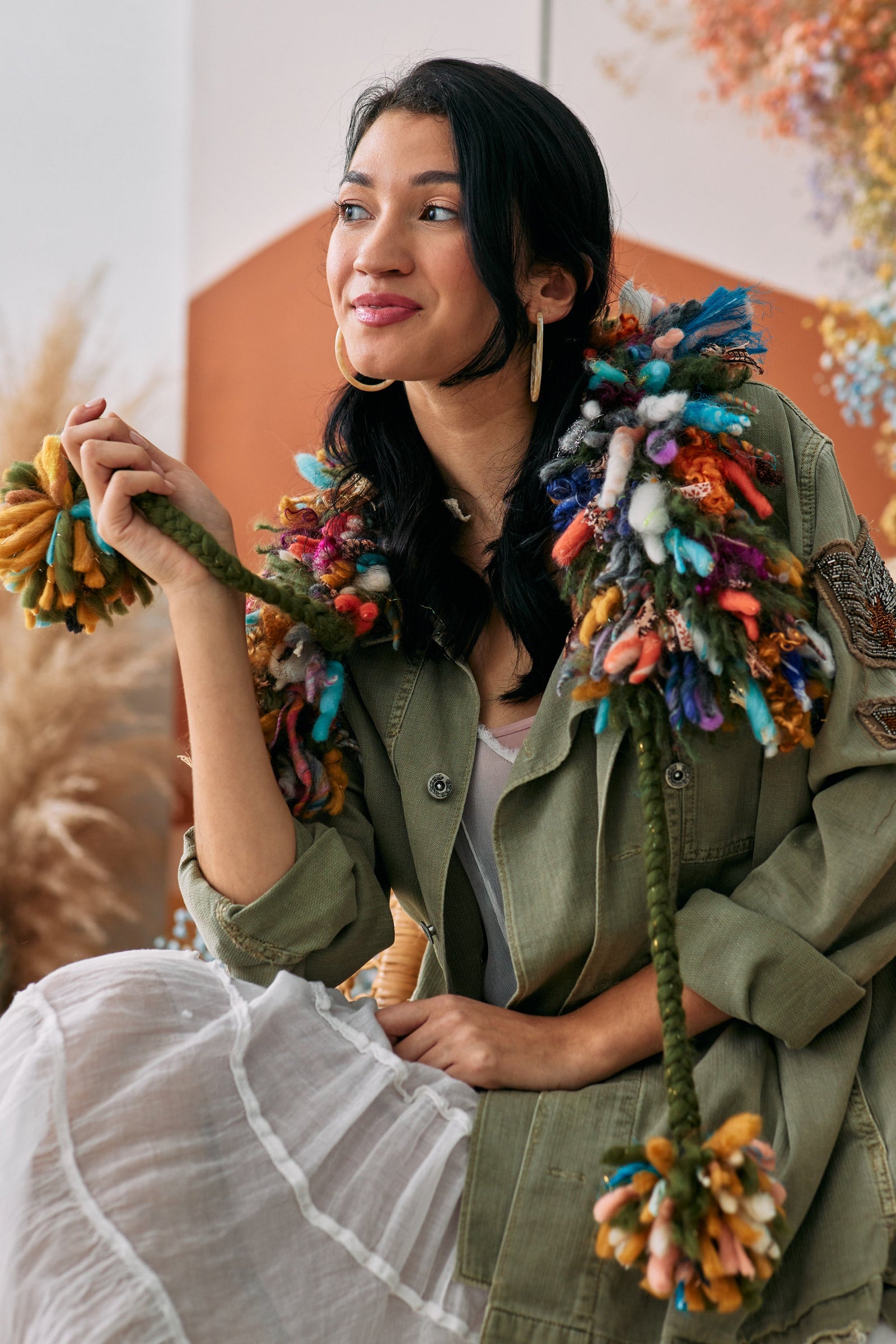 Model holding part of the Famous collar