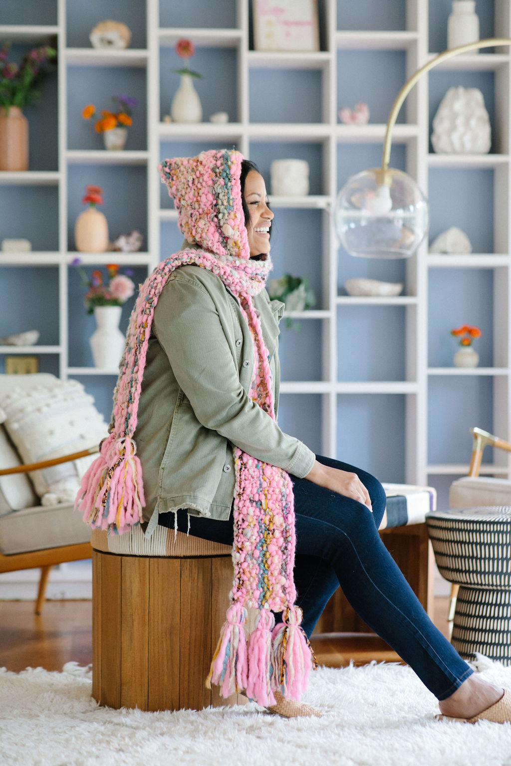 The Gotta Be Hoodie Scarf is a combination of hat and scarf to wrap around your neck