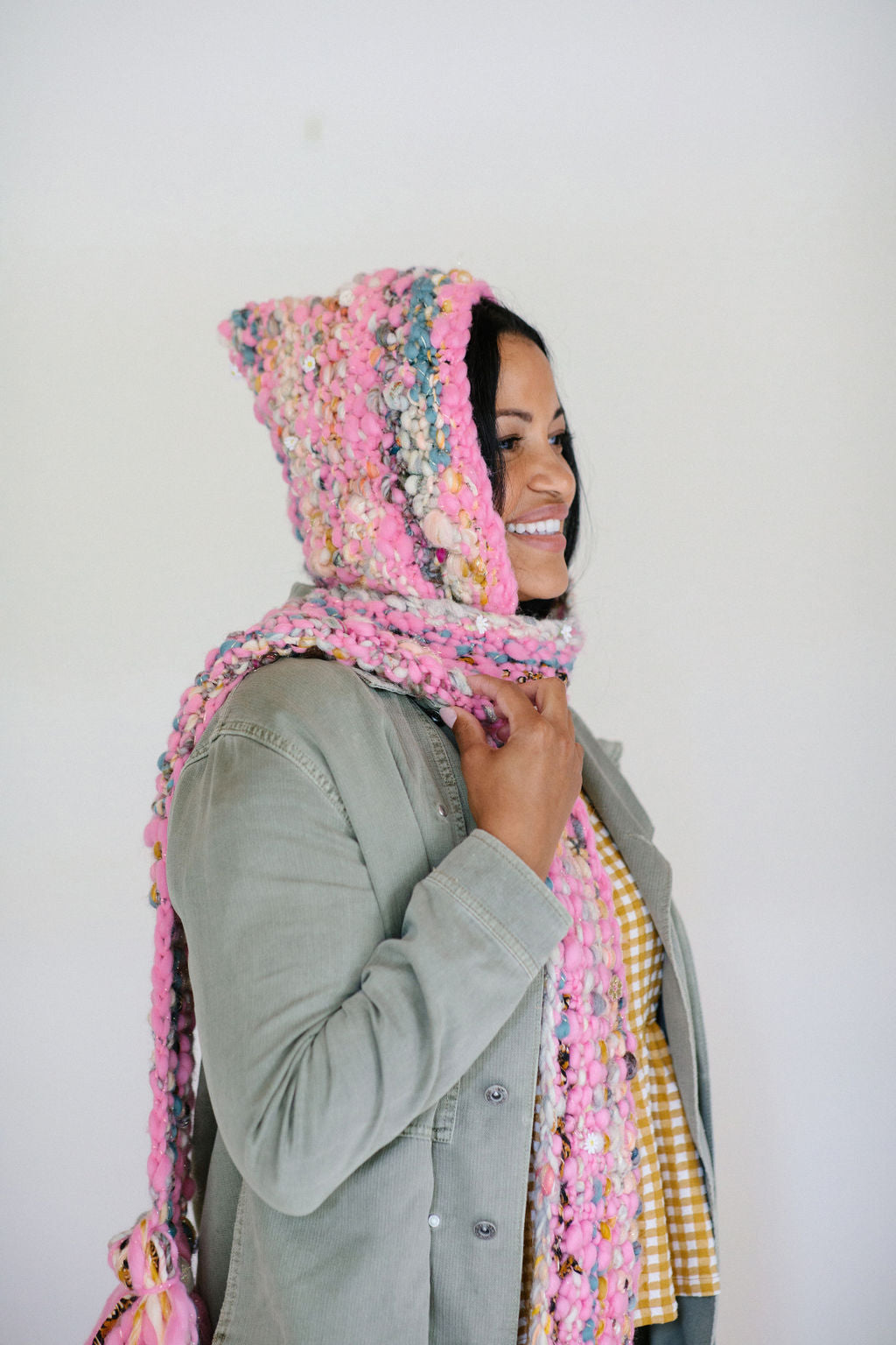 Model wearing the Gotta Be Hoodie Scarf in the Bubblegum Candy combo