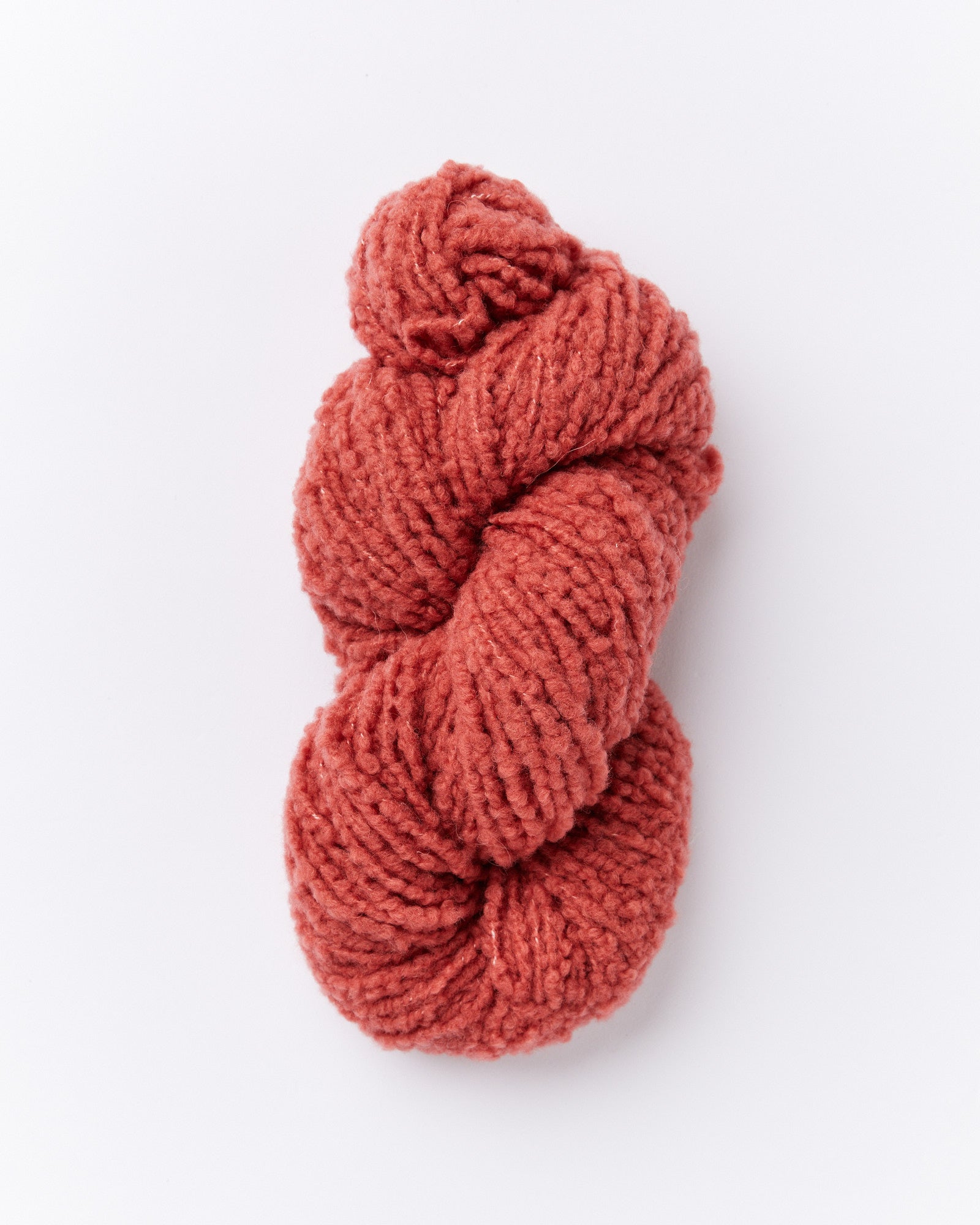 A brushed boucle yarn in a brick red color