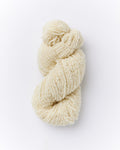 A brushed boucle yarn in ivory white