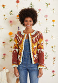 The Magic Mountain Cardi is an all-over colorwork sweater that is steeked (cut) to form a cardigan