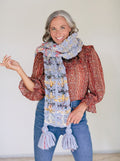 Model wearing scarf.
