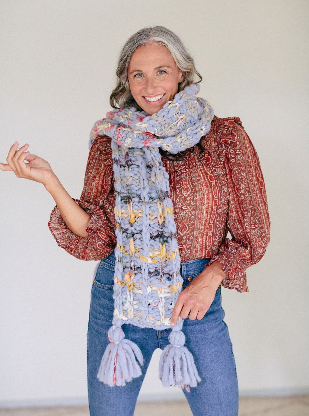 Model wearing scarf.