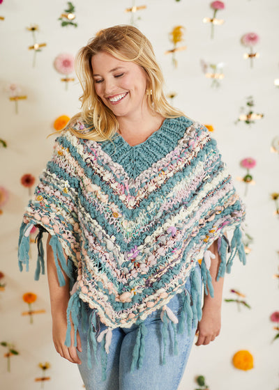 The Shake Your Groove Thing Poncho is a great first project for a beginner knitter.