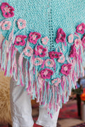Close-up of back bottom point of triangle knit shawl