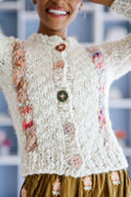 Buttons are sewn onto the Winding Road Cardi for a fitted look when closed
