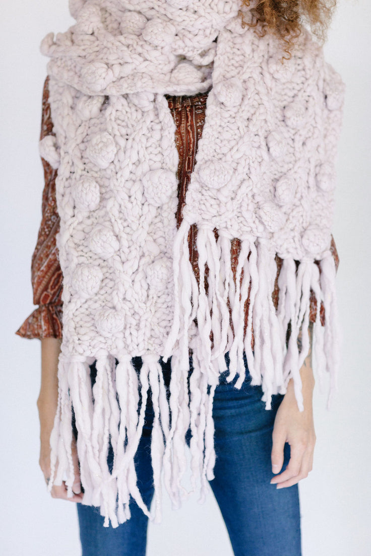 Model wearing scarf.