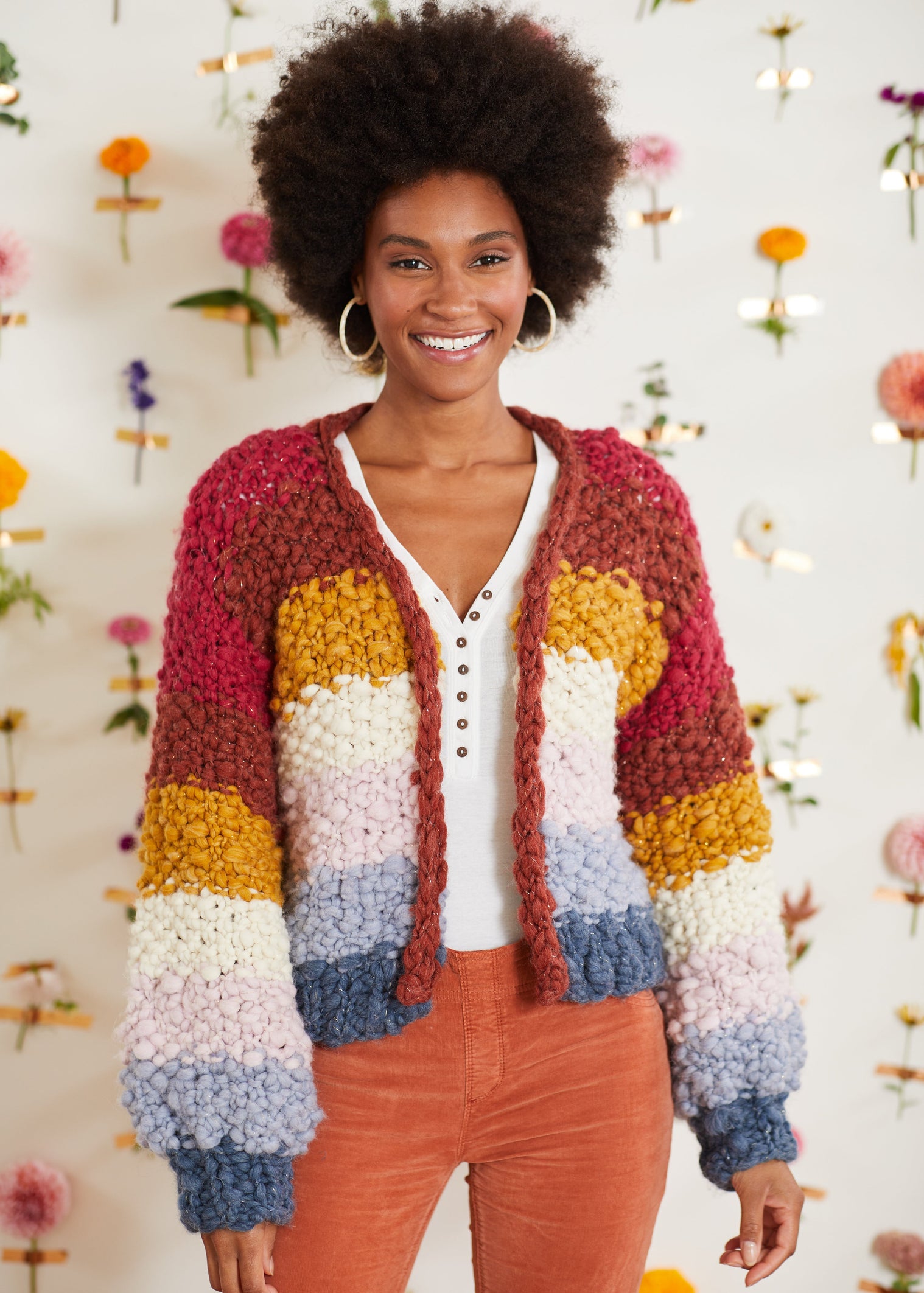 Model wearing handknit cardigan Over the Rainbow