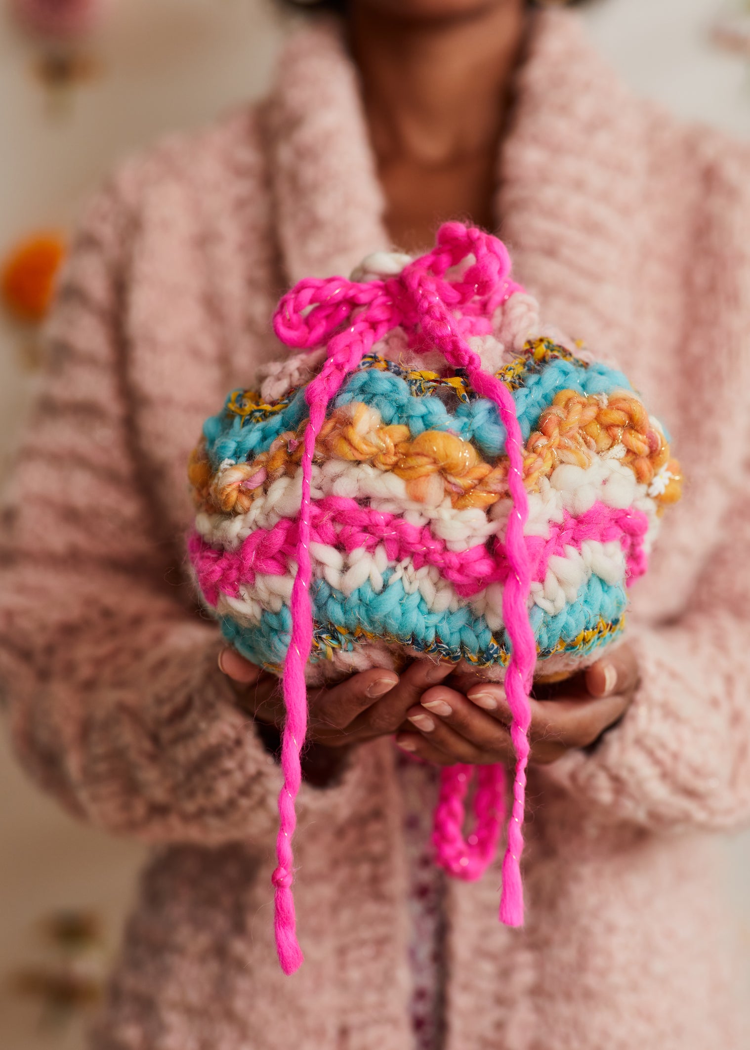 Brightly colored round, handknit bag